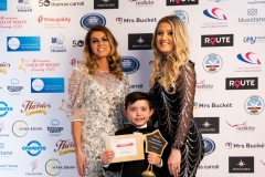Fraizer Harris, Young Sporting Hero U13 2023, with Rachael Flannagn from Mrs Buckét and his mum Katie